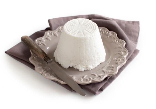 italian ricotta cheese with knife on napkin isolated on white202769 1787